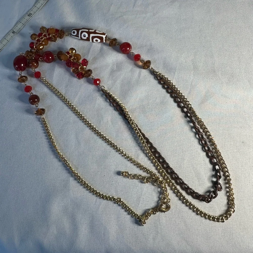 Long goldtone sparkly statement necklace